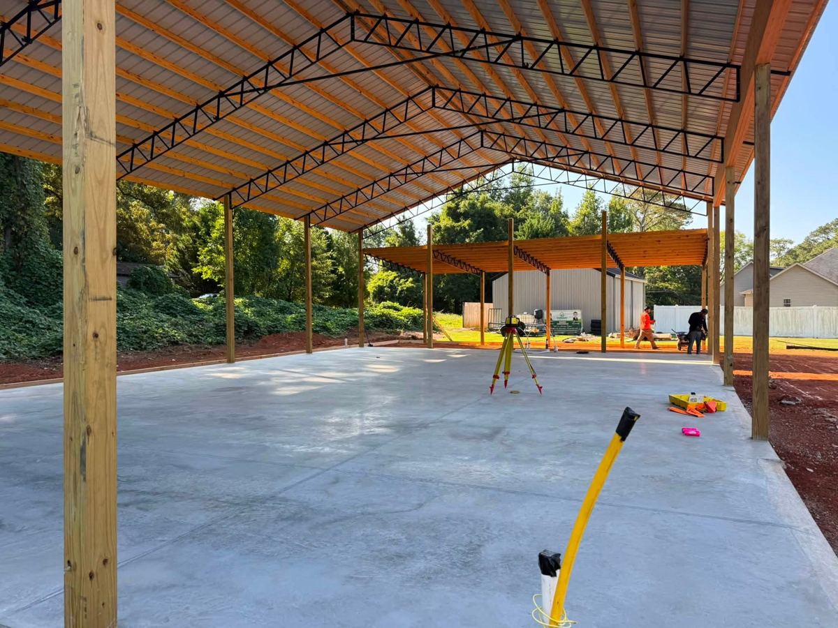 A finished smooth slab under a pole barn